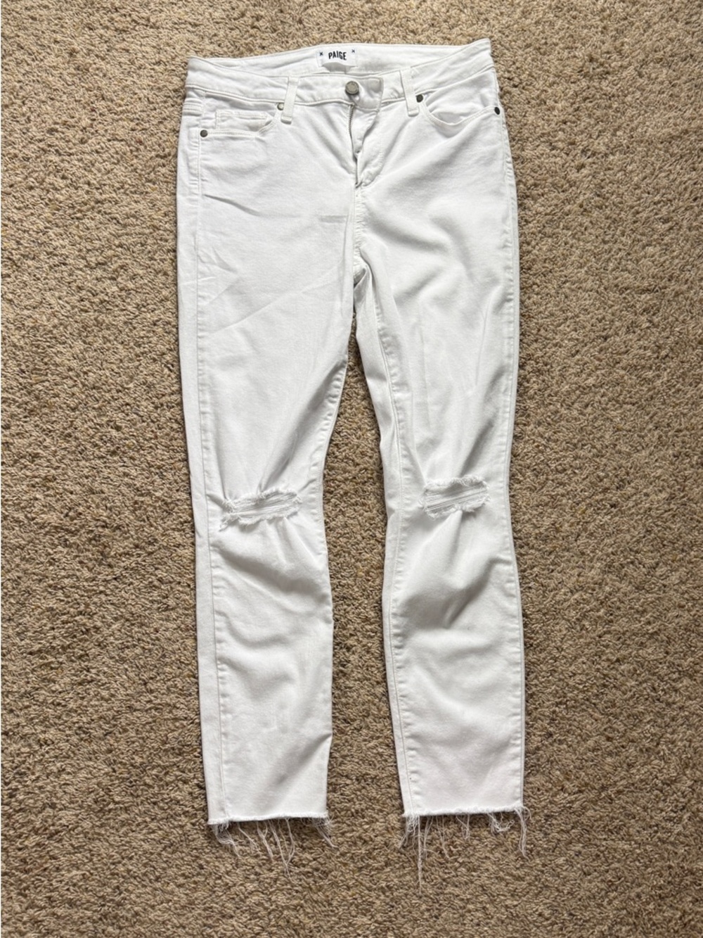 PAIGE White Skinny Jeans with Knee Rips and Raw Hem